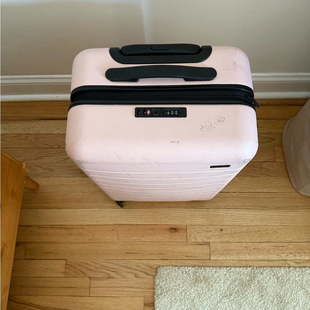 Away Pink Carry-On Suitcase with Built-In TSA Lock